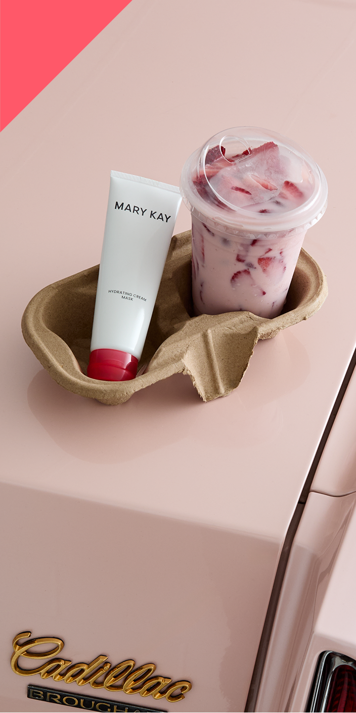 A close up of a woman's face with eye cream.